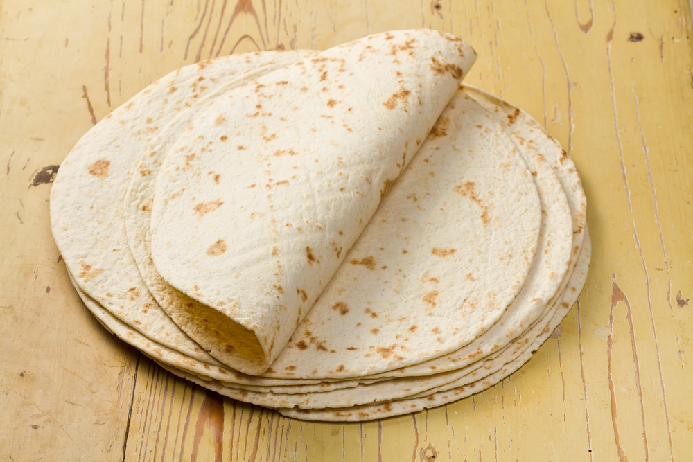 flour-tortillas-on-wooden-table