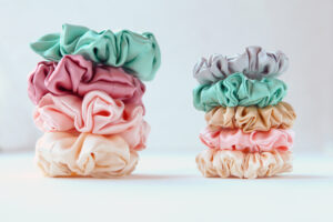 two stacks of colorful scrunchies