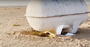 Object Stirred Beneath A Water Tank In 122-Degree
Desert